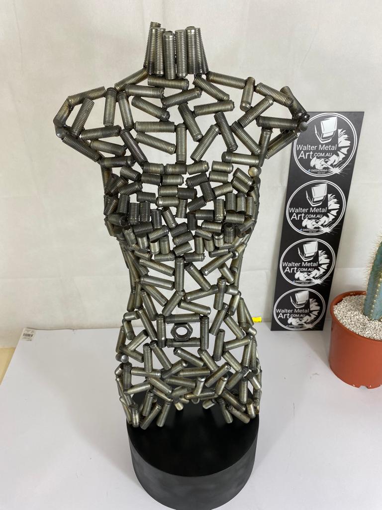 Metal - art sculpture female torso as a still image, can be made on request
